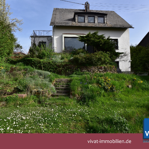 Einfamilienhaus mit süßem Garten und grünem Weitblick! (35647 Waldsolms)