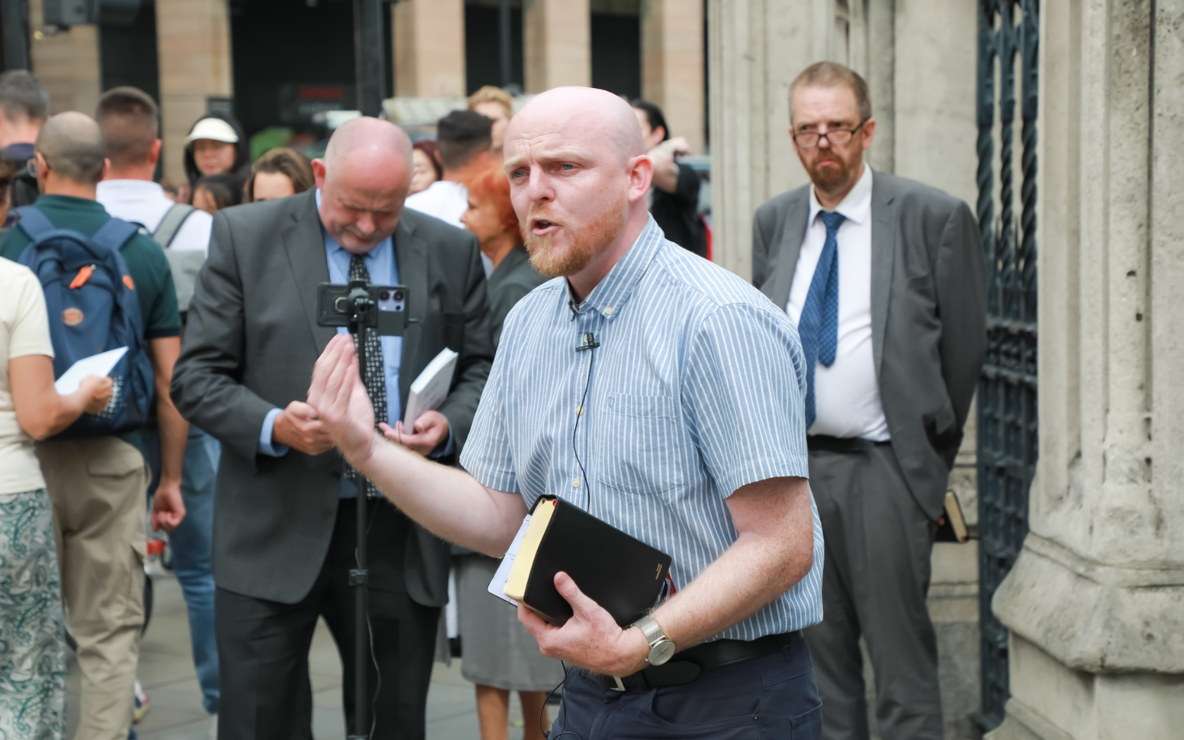 Ministers gather outside Parliament in London for open-air witness